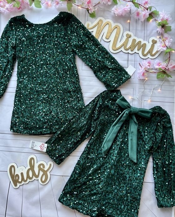 Sukienka na święta dla dziewczynki w cekiny z kokardą zielona nowa