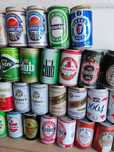 Latas de bebida antigas para colecionadores