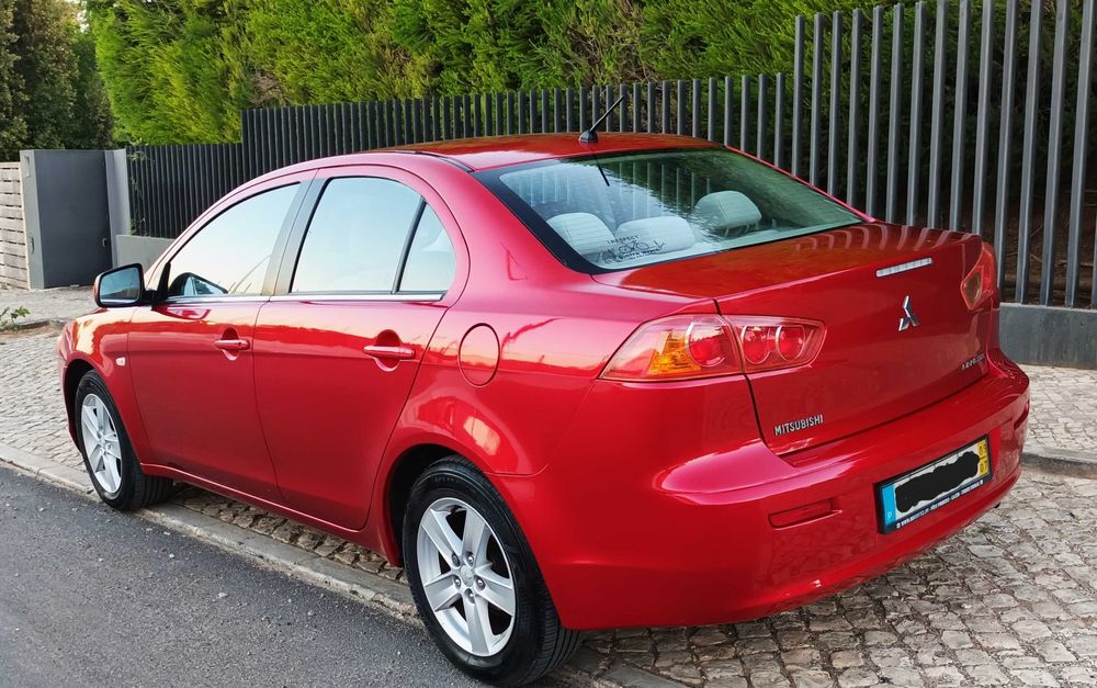 Mitsubishi Lancer 1.5 gasolina, 2009, só 121.800 Km. Excelente.