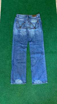 Spodnie jeansy z przetarciami Dolce & Gabbana Ittierre rozmiar 34 48