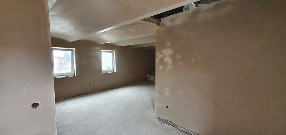 Tynki maszynowe gipsowe i cementowe - firma KONKRET