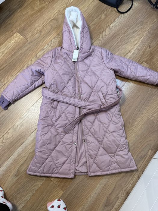 Нова куртка пальто