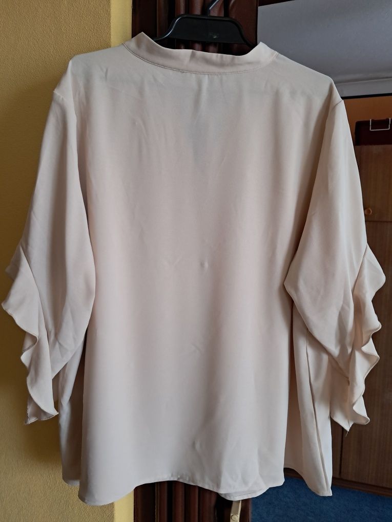 Nową bluzka beżowa rozmiar 4 xl
