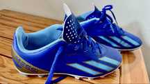 Chuteira infantil Adidas “Messi”