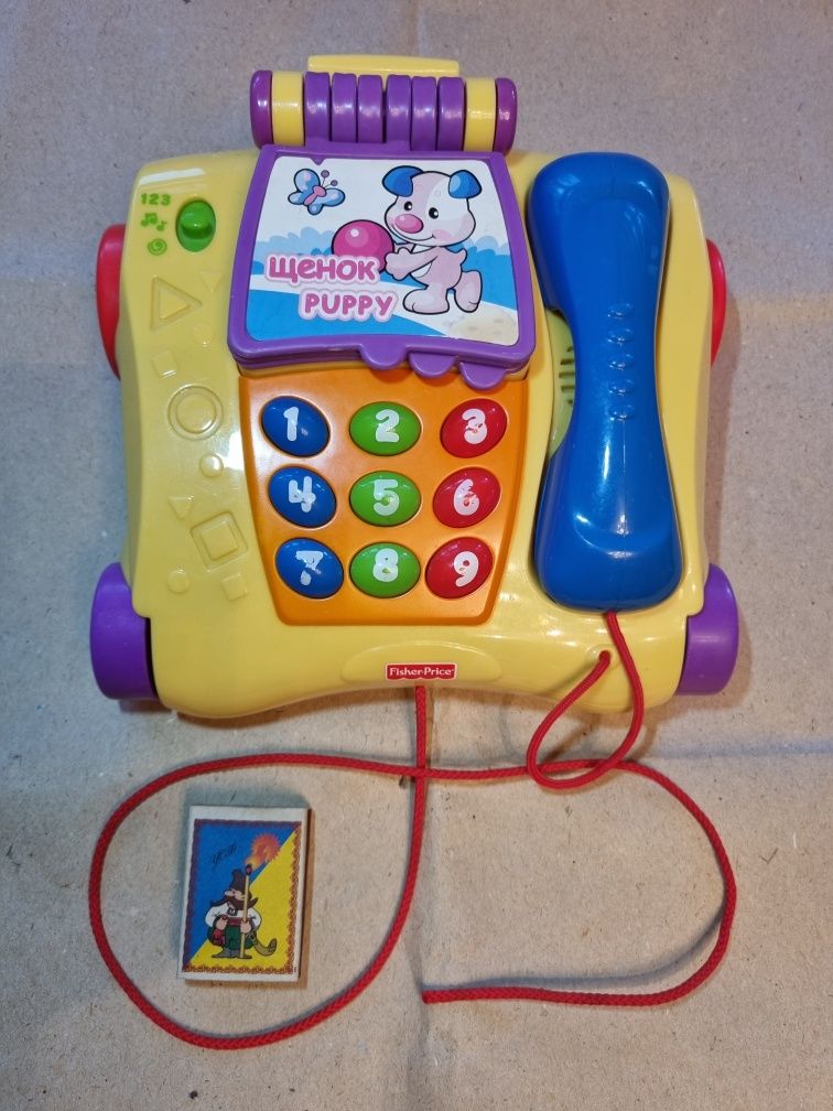 Развивающая игрушка каталка Обучающий телефон Fisher Price