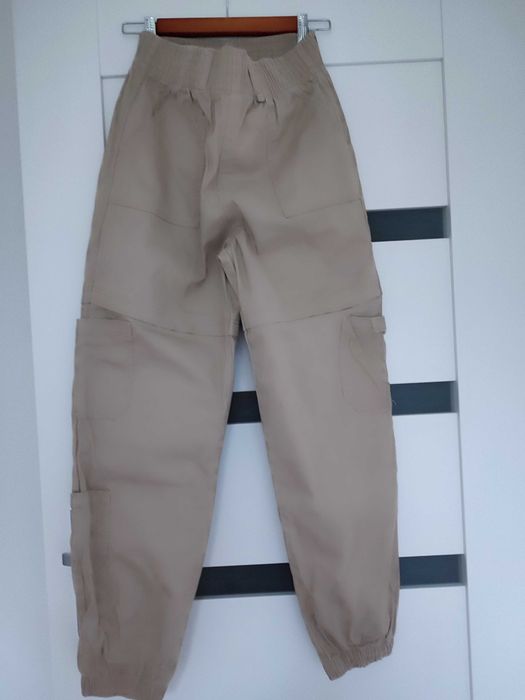 Dziewczęce spodnie Reserved rozmiar 164