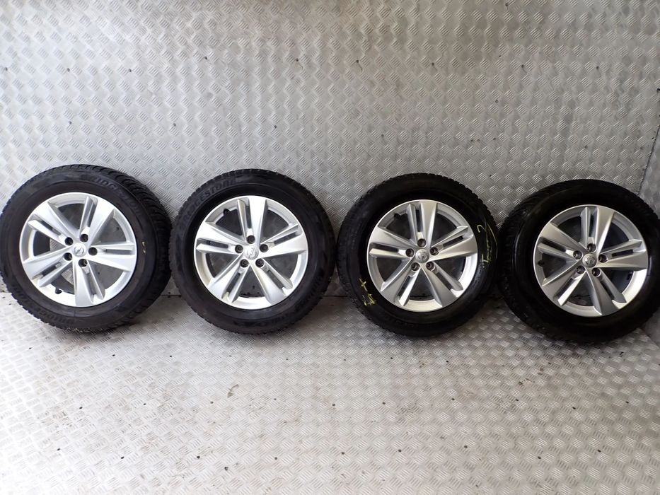 KOŁA FELGI ALUMINIOWE OPEL GRANDLAND  7JX17  ET 42   5X108 PS082 K4  YP00064180 Z OPONAMI ZIMA BRIDGESTONE 215/65/17