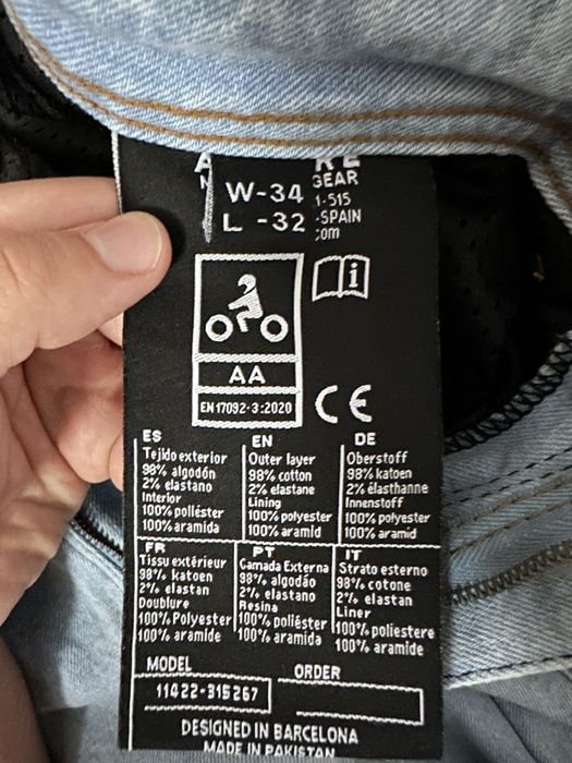 Calças jeans de motard com proteção joelhos e ancas