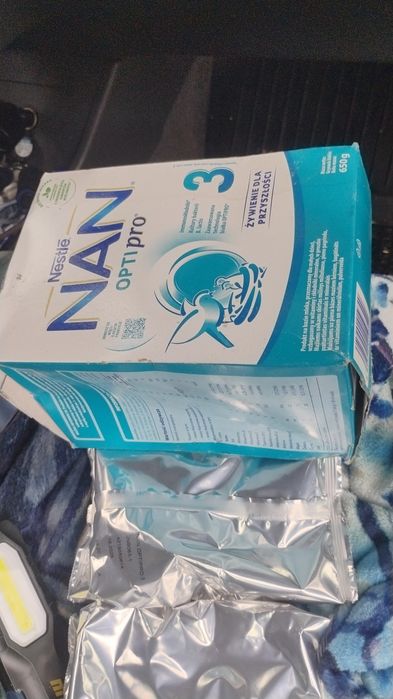 Man opti 3mleko w proszku  4 razy 325 gram. Dwa opakowania po 650 gram
