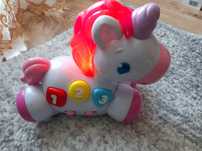 Bright Starts Jednorozec Rock& Gow Unicorn 6mies+