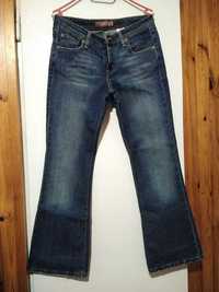 Spodnie jeansy Levi's 518 Superlow Boot cut, niebieskie dzwony, rozm M