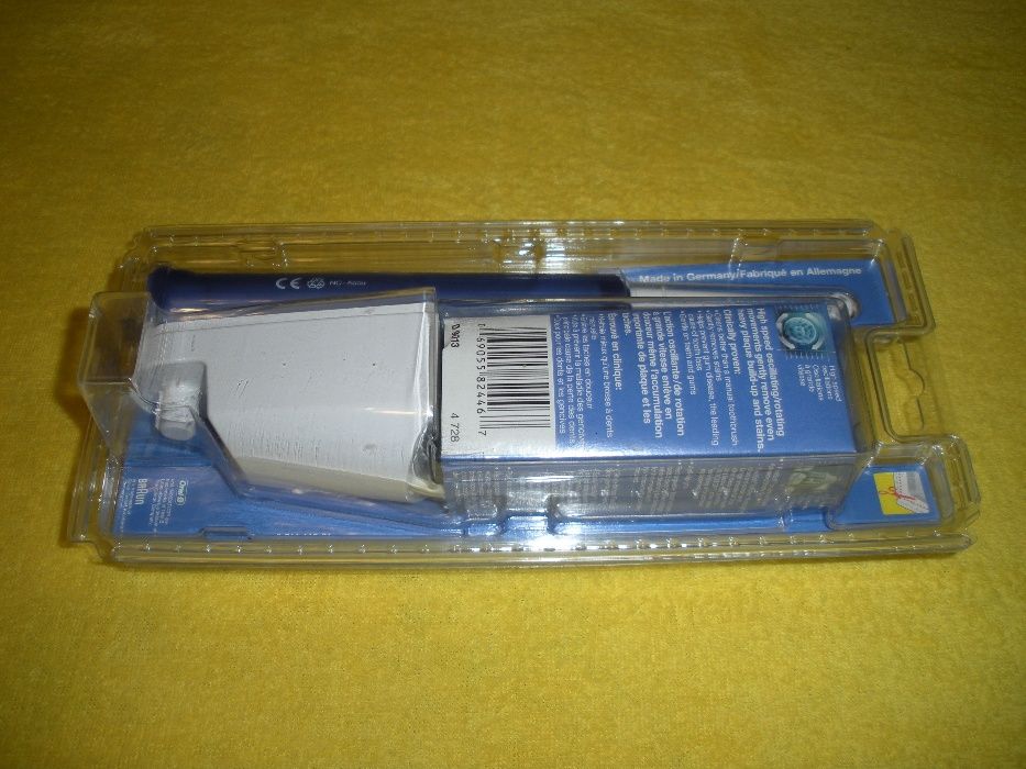 Электрическая зубная щётка “Braun Oral-B Plak Control Ultra”.