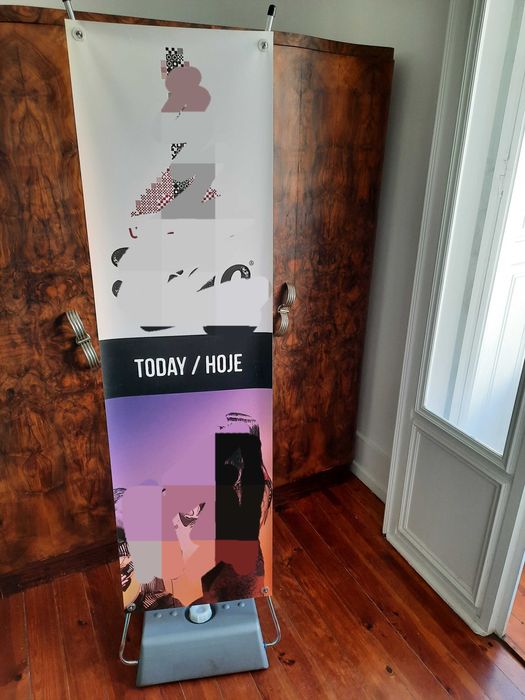 Porta-cartaz portátil