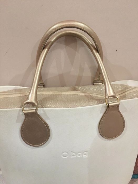 OBAG szampańskie złote uchwyty micro tubolare i organizer Nomi mini