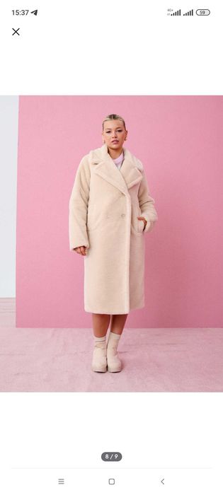 Довге пальто бежевого кольору