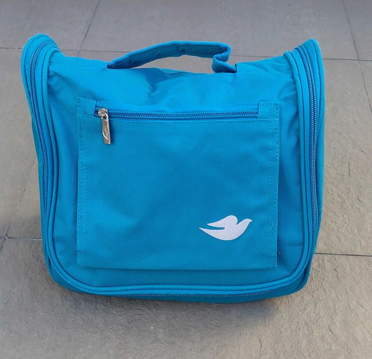 Saco bolsa transporte cosmética shampoos marca DOVE