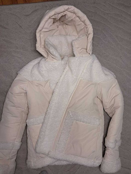 продам бежеву куртку