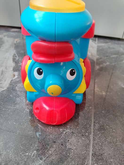 Паравозик fisher-price(музичний на батерейках)