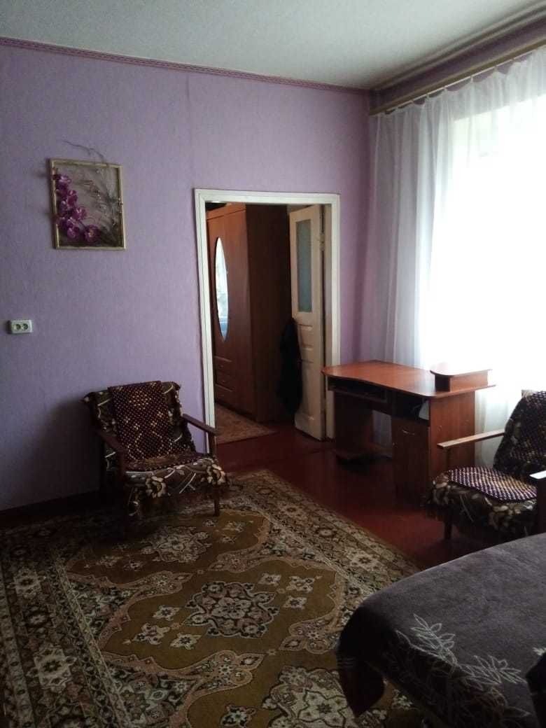 Продам половину будинку в місті Охтирка