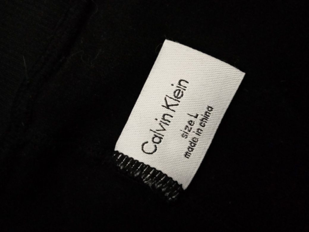 Calvin Klein czarne legginsy L