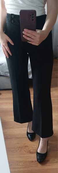 Eleganckie czarne spodnie z szerokimi nogawkami vintage wysoki stan
