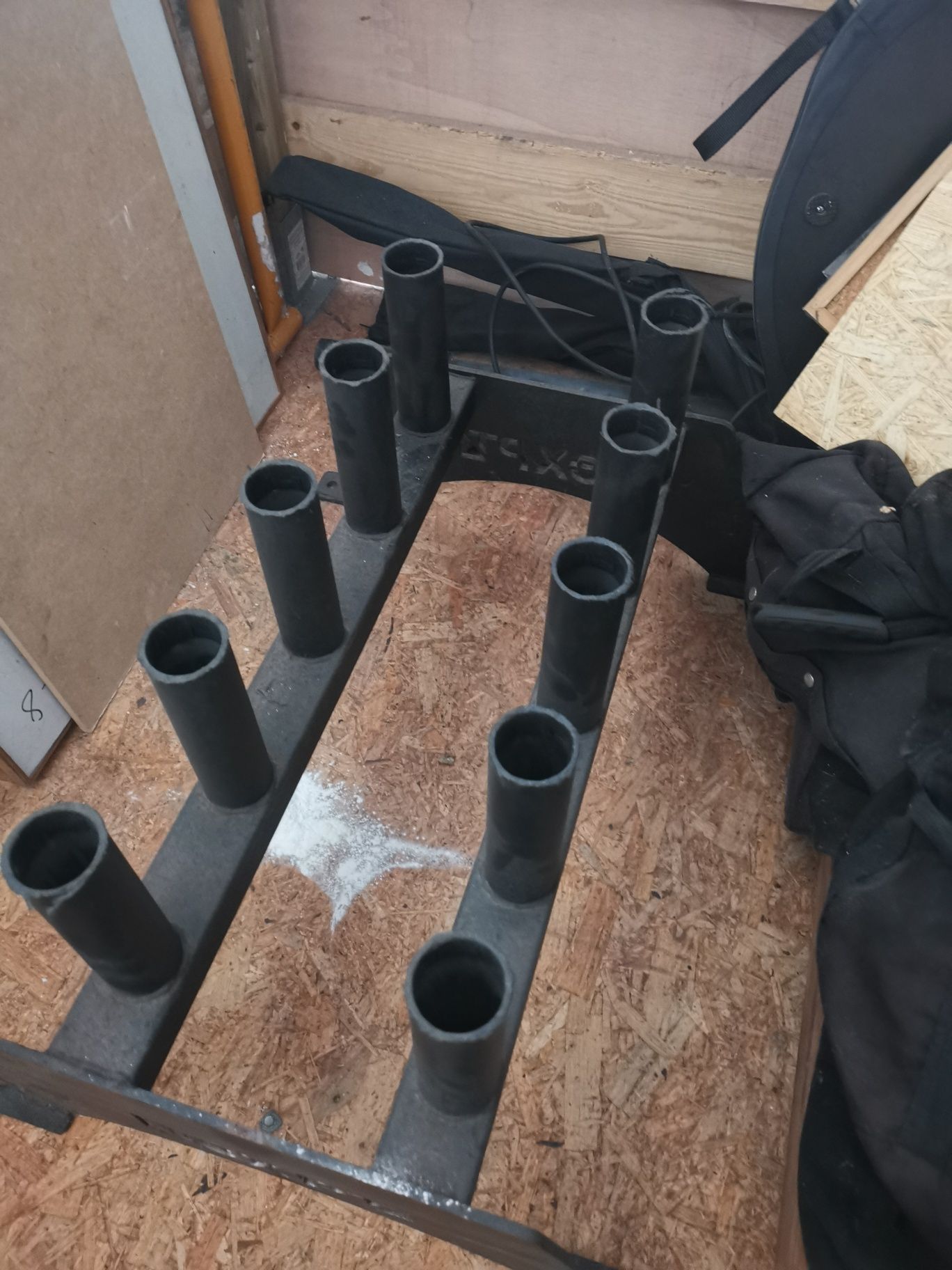 Arrumação vertical para barras olímpicas