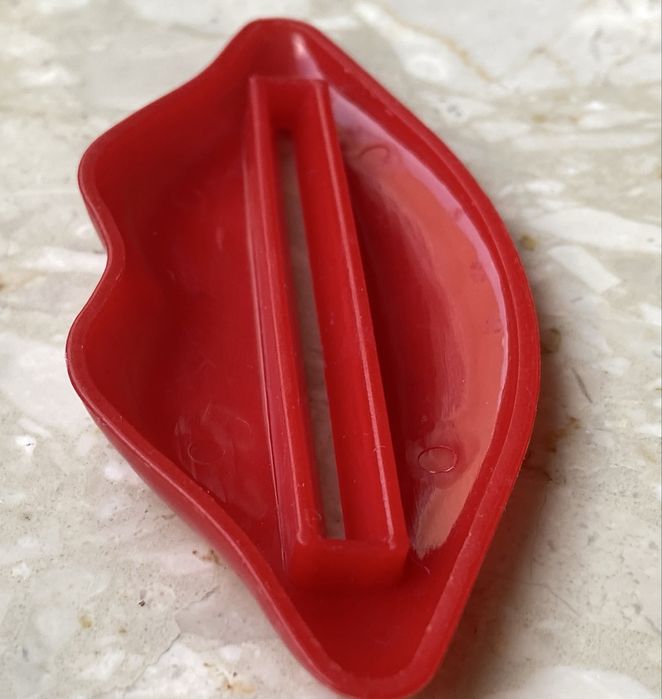 Wyciskacz Usta do pasty do zębów / do tubek z kremem