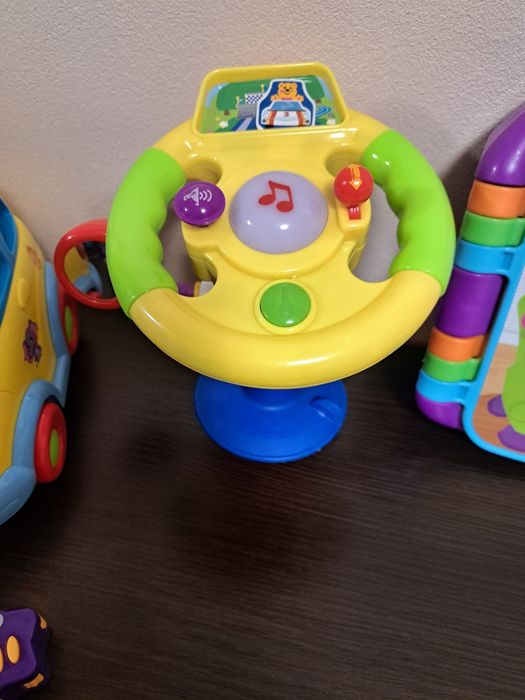 Книжечка з віршиками, руль та машинки