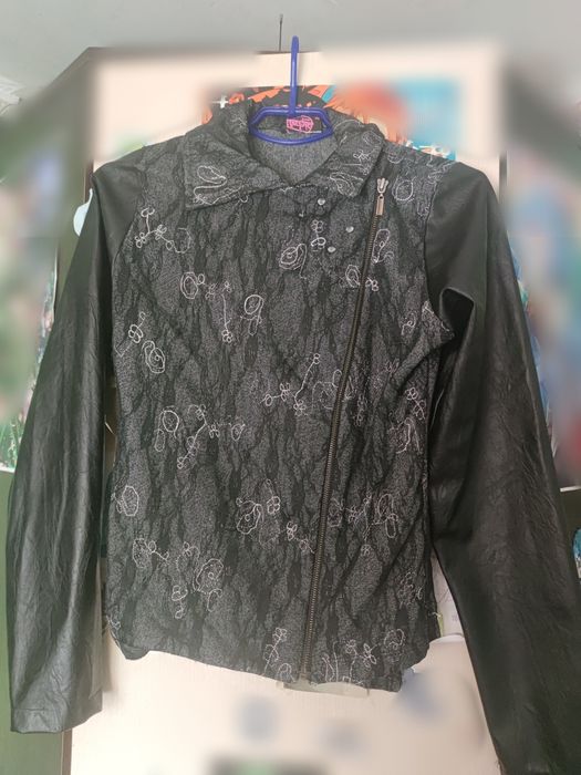 Чорна куртка-косуха