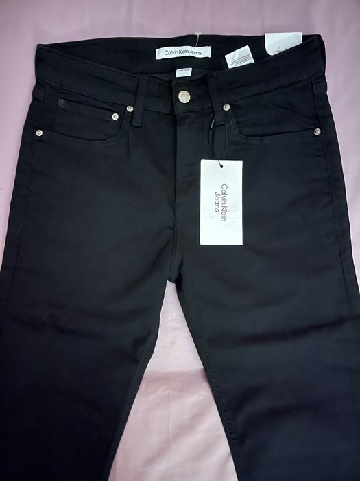 Wyprzedaż spodnie męskie Calvin Klein Jeans.