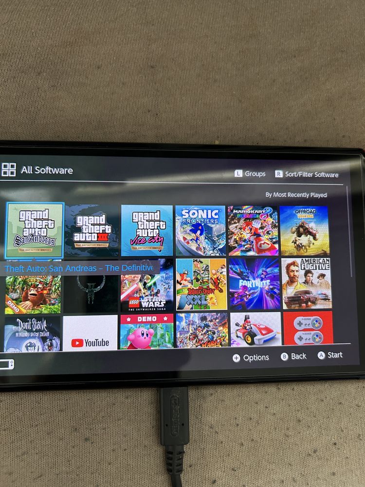 Nintendo switch oled +dużo gier i dodatków