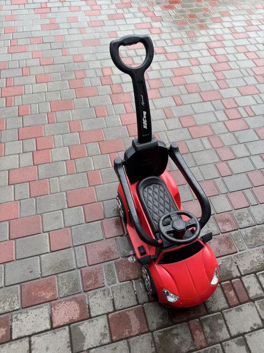 Продам дитячий електромобіль з батьківською ручкою