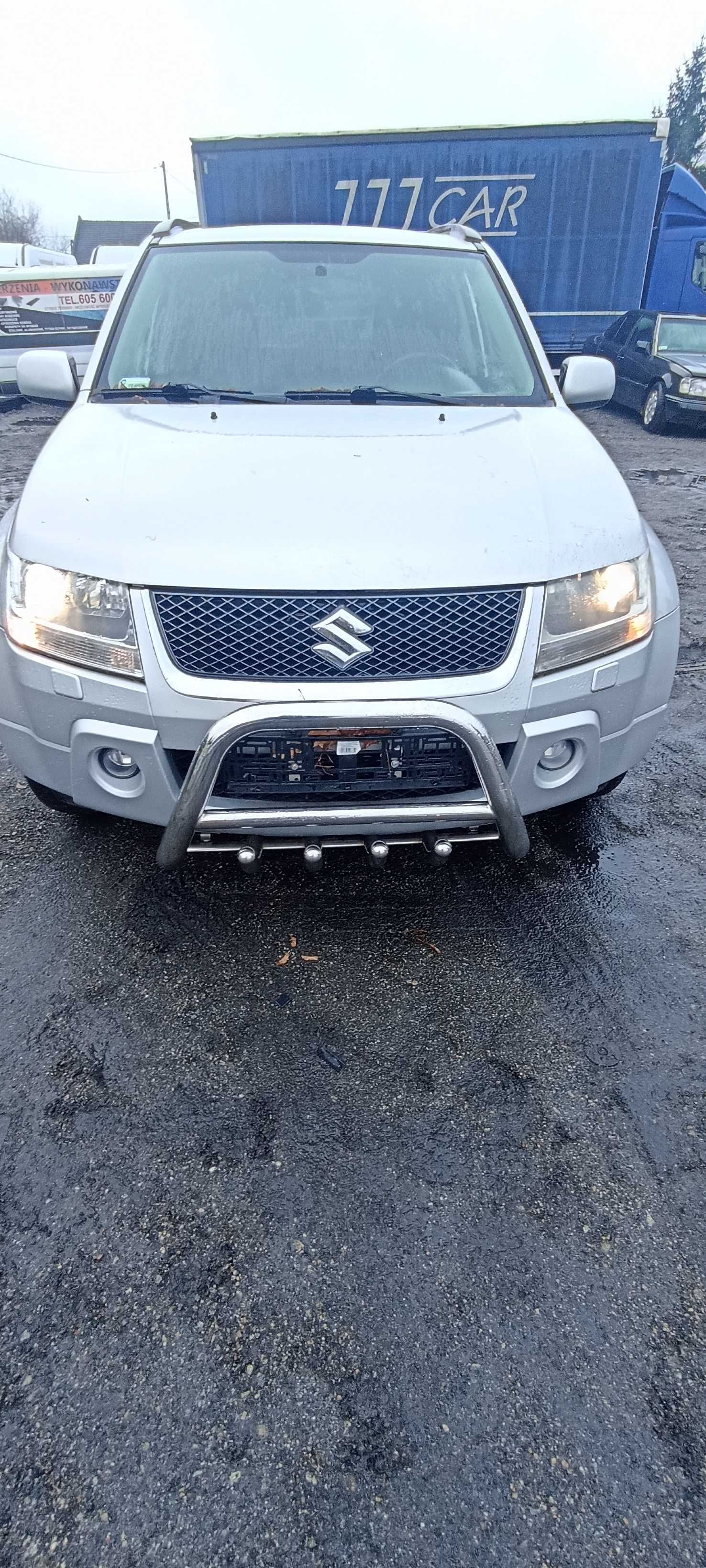 błotnik przód przedni grand vitara 1.9 ddis 06r lak Z2S
