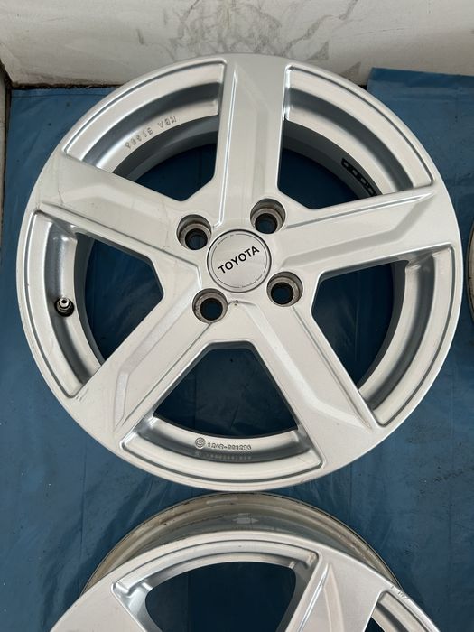 650 Felgi Aluminiowe TOYOTA R 15 4x100 otwór 54 Bardzo Ładne