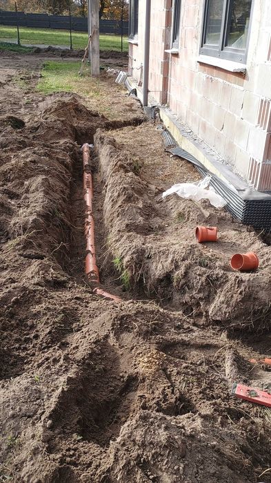 Koparka montaż zbiorników odwodnienia roboty ziemne transport krakow