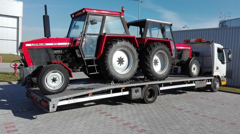 pomoc drogowa laweta transport domek bus koparka widlak przyczepa