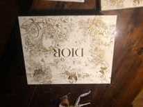 Kartony Dior w wersji limitowanej,  edycja świąteczna cale zlote logo