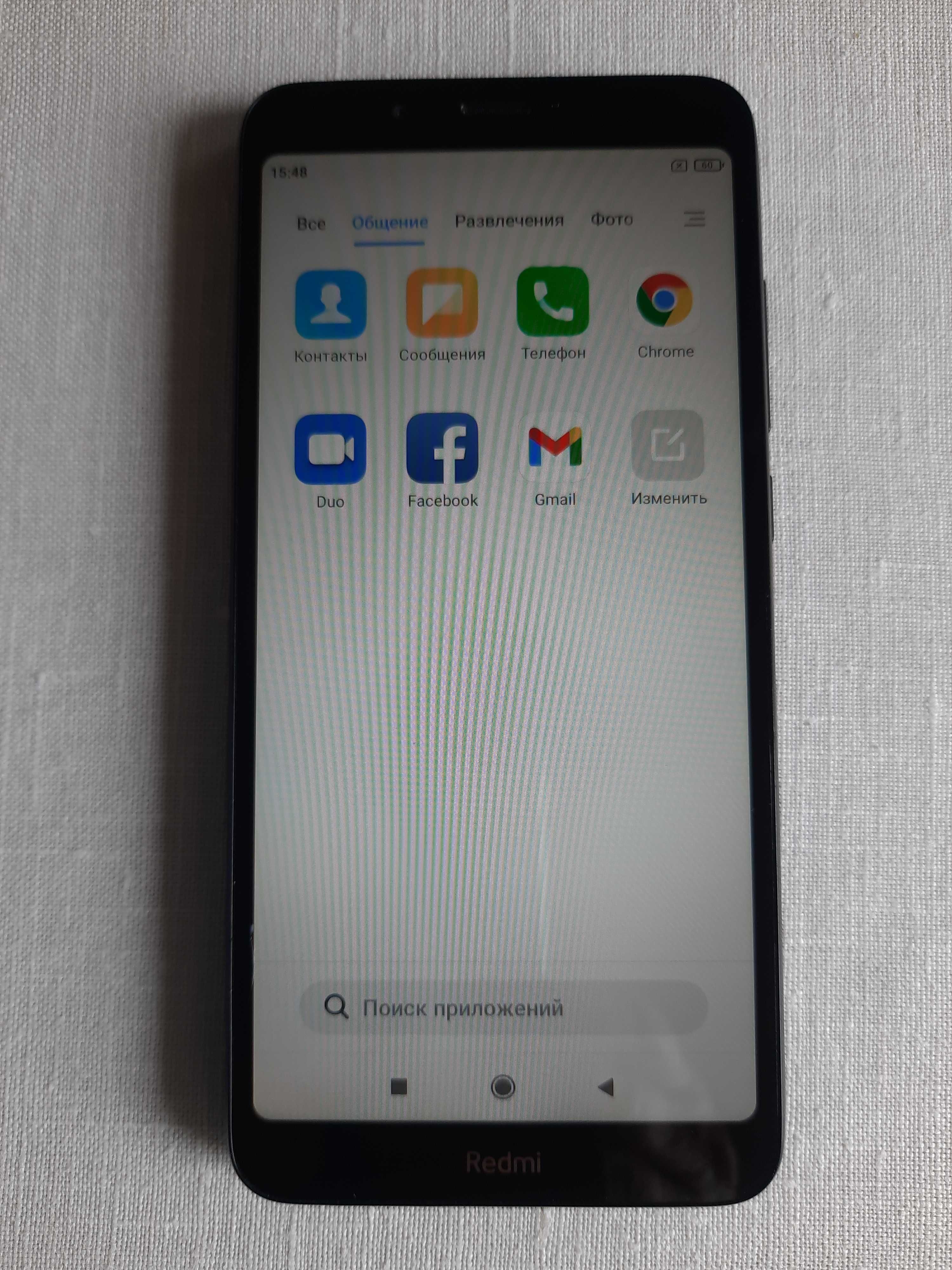 Телефон Xiaomi Redmi 7a черного цвета + чехол + зарядное.