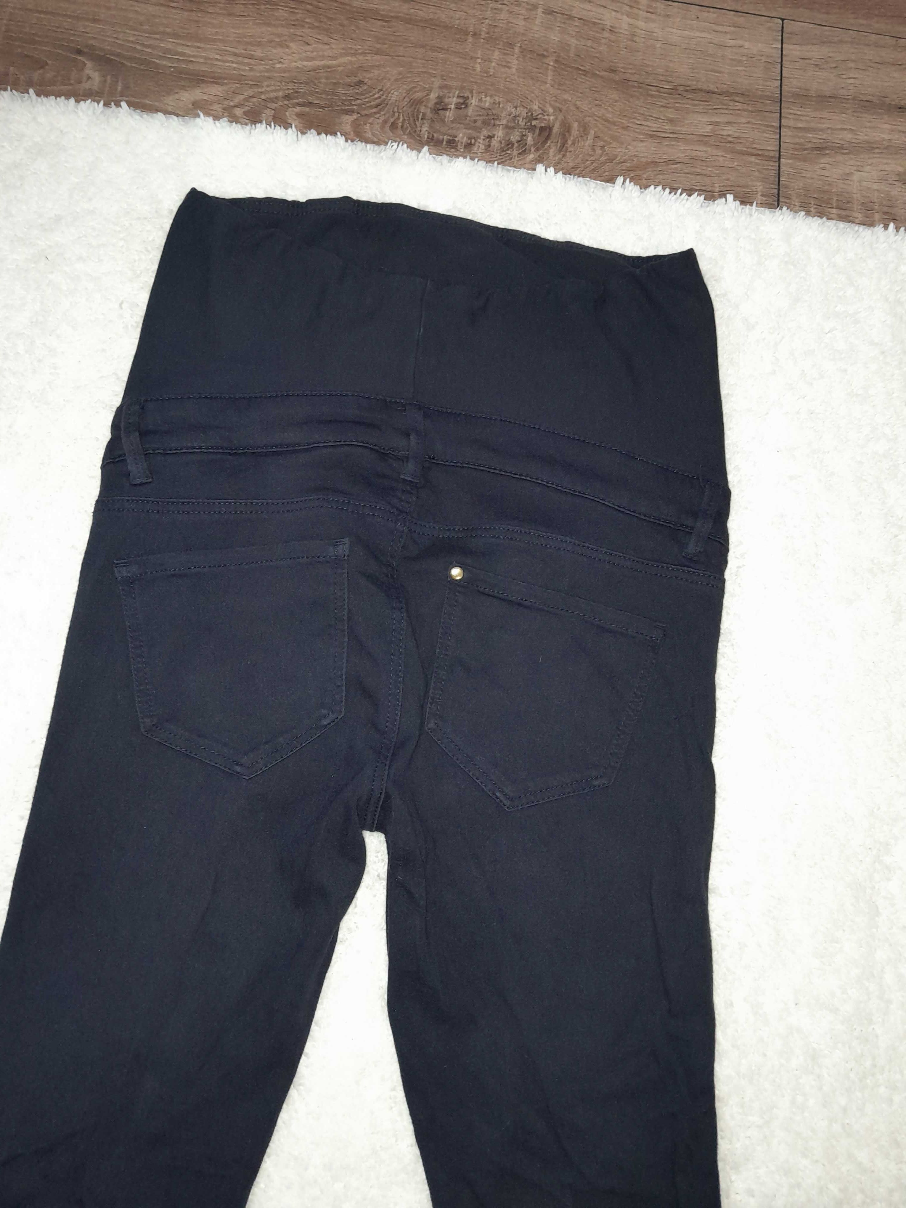 Spodnie ciążowe  jeansy z H&M.