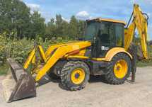 Fermec 860  Koparko-ładowarka