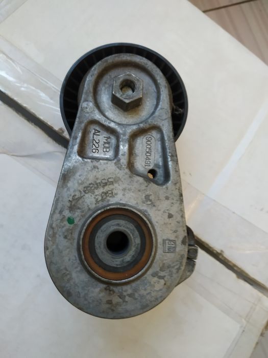 Натяжной ролик 90050491 Opel Astra 2020