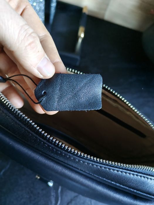 Elegancka saszetka czarna męska pojemna skóra naturalna