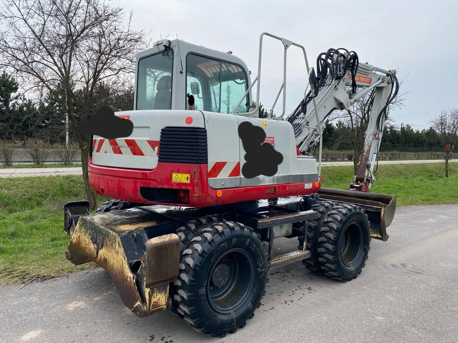 Koparka kołowa Takeuchi TB175 w rok 2011