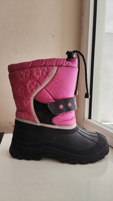 Botas de neve de criança