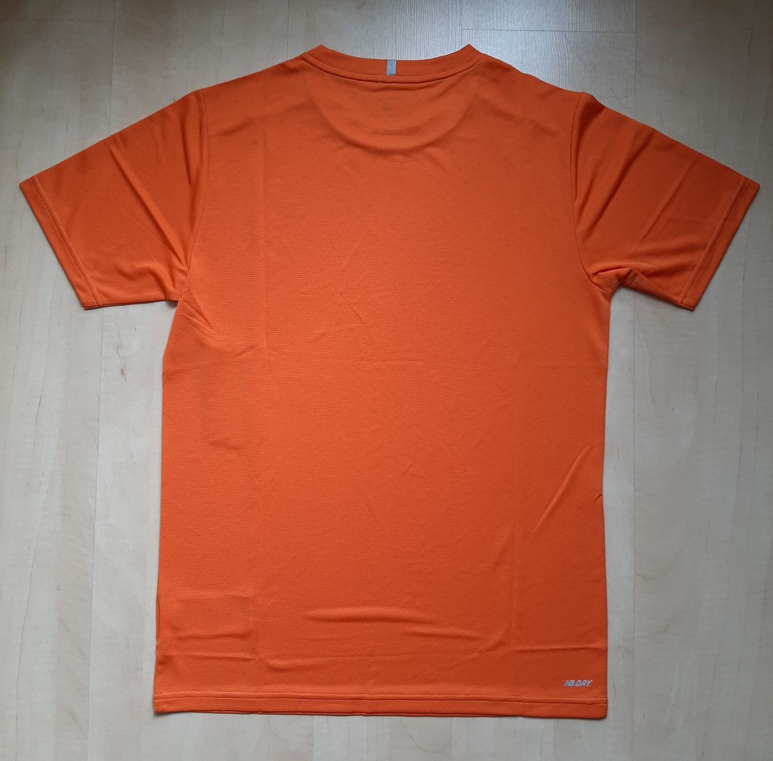 Pomarańczowa, szybkoschnąca koszulka NEW BALANCE, roz. S