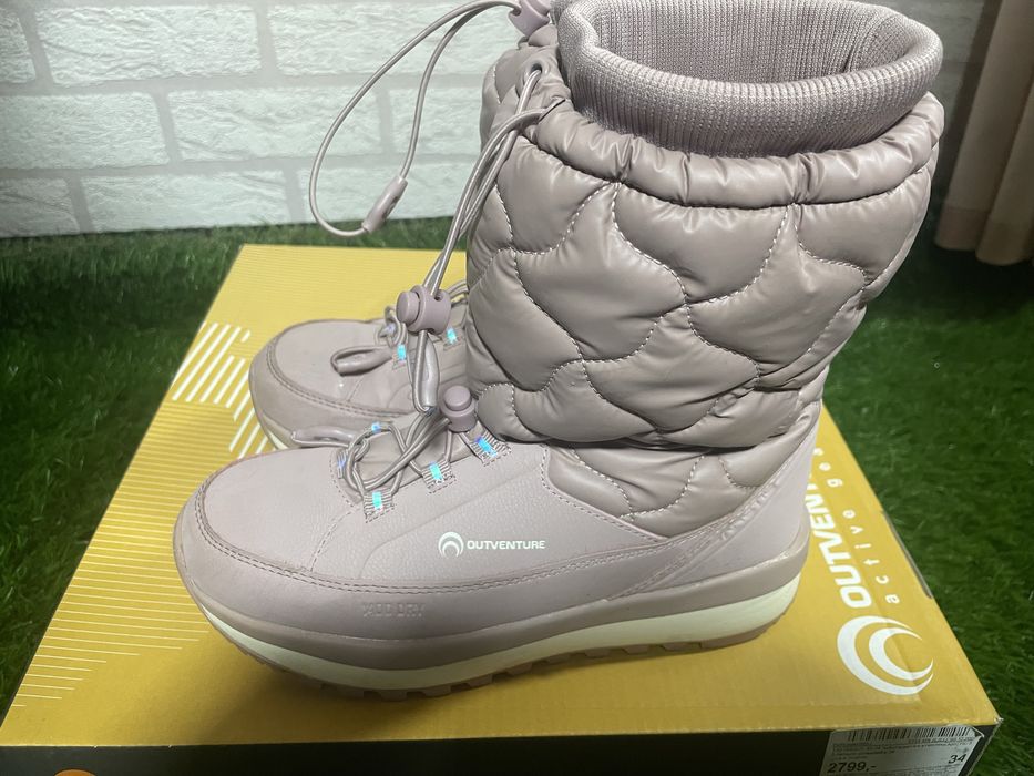 Продам зимні чоботи