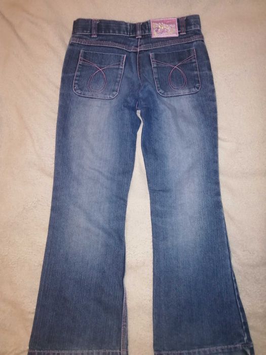 Dwie pary spodni dżinsowych - 128 cm