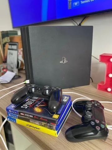 Playstation 4 pro 1TB com 5 jogos