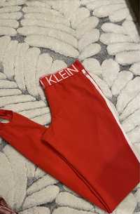 Czerwone leginsy Calvin Klein XS 34