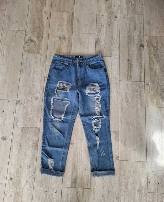 Spodnie z wysokim stanem spodnie z przetarciami 38